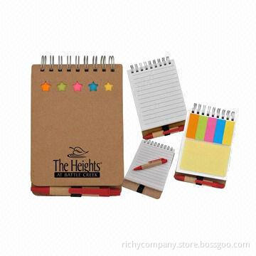 Notebook with ballpen and notes